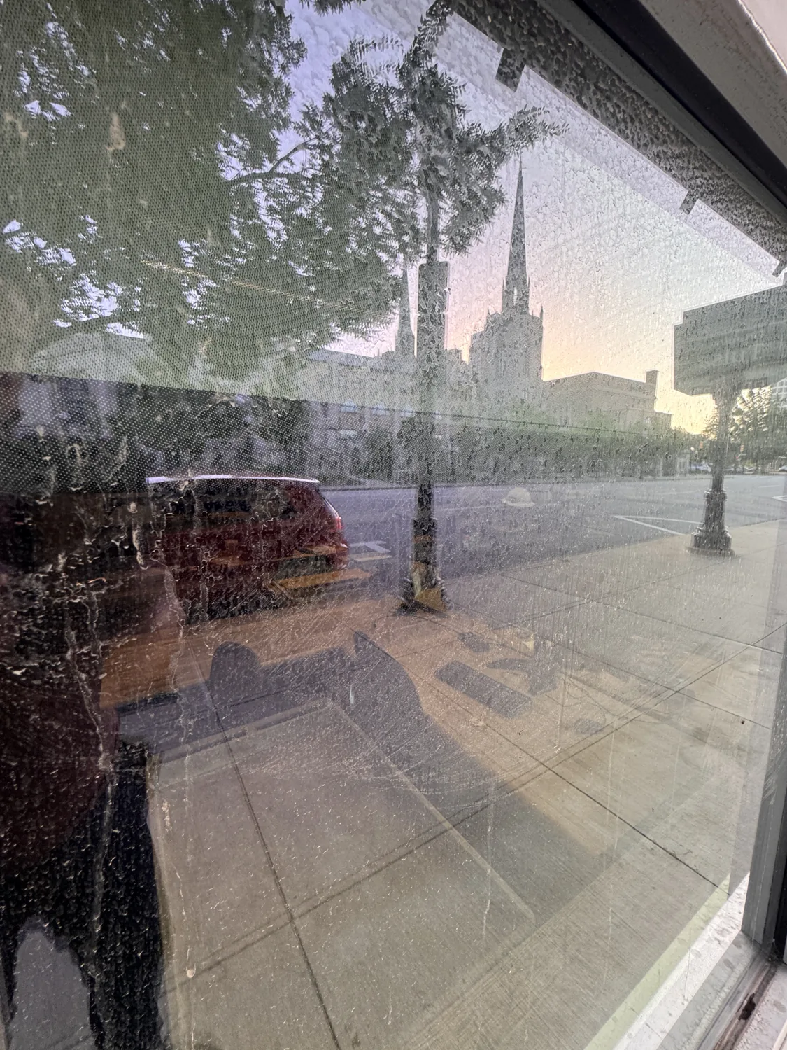 Streaked exterior glass before cleaning by Parmelee in Tulsa